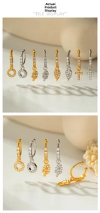 Détail de pendentifs croix et cœur en or et argent avec micro-incrustations de zircon