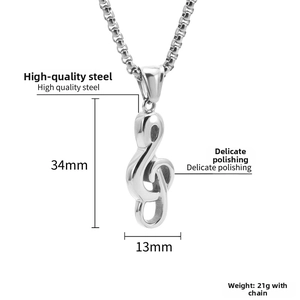 Detailed view of polished stainless steel G-clef pendant with 34mm by 13mm dimensions