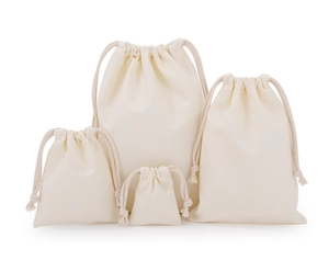 Four different sizes of plain off-white drawstring cotton canvas storage bags shown together