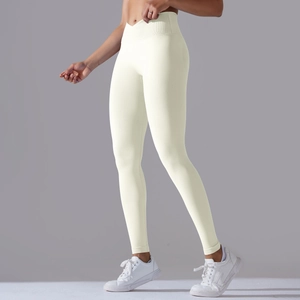 Detail view of seamless yoga leggings featuring high-waisted V-cut and peach lift design