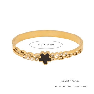 Détails des dimensions d'un bracelet doré en acier inoxydable avec fleur noire et cristaux
