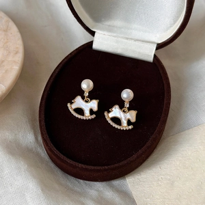 Elegant gold rocking horse pearl earrings with white mother-of-pearl and zircon inlay