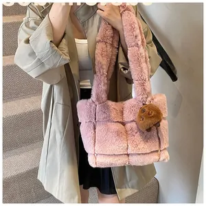 Pink quilted faux fur shoulder bag detail with a cute brown plush bear charm accessory
