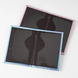 Detail view of pink and blue holographic passport covers showing internal card slots
