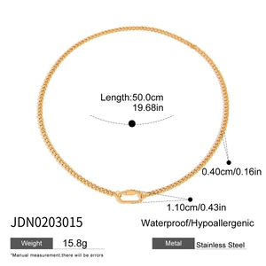 Detail of 50cm gold Cuban link necklace with carabiner clasp and size specifications