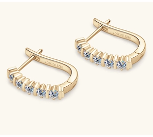 Close-up of S925 sterling silver gold-plated U-shape earrings with D0.30CT moissanite