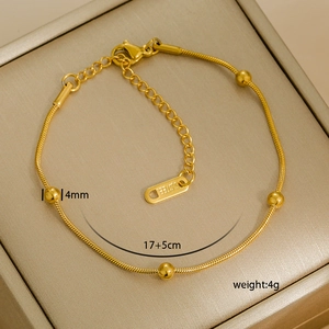 Detail view of 18k gold plated stainless steel anklet with 4mm beads and adjustable chain