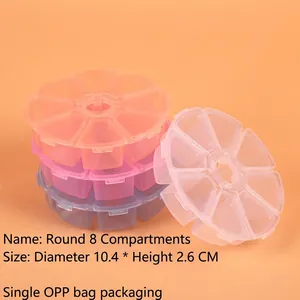 Detail of 8-compartment circular plastic storage box showing pink and blue color options