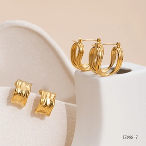 Gold-plated stainless steel earrings with wavy lava texture and multi-layer hoop designs