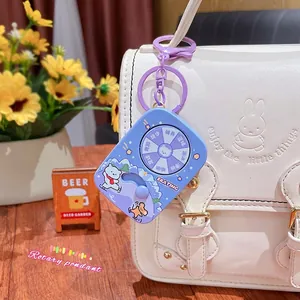 Cute rotating sports cartoon bear pendant keychain with blue and purple ABS design