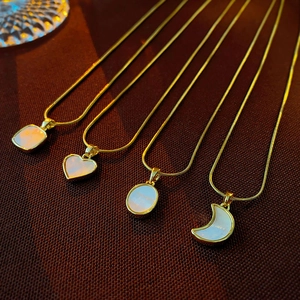 Golden stainless steel mother of pearl necklaces in heart, moon, oval and square shapes