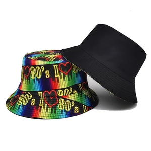 Reversible 80s retro music note bucket hat for men and women with black side