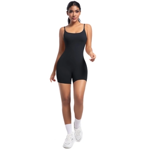 Front view of black slim-fit yoga bodysuit with thin straps and matte elastic fabric