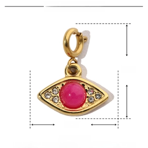 Detail view of 15mm evil eye pendant with red stone and rhinestones in gold finish
