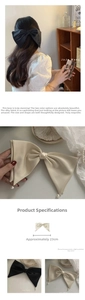 Detail of silk bow hair clip with pearl pendant and 23cm size measurement guide