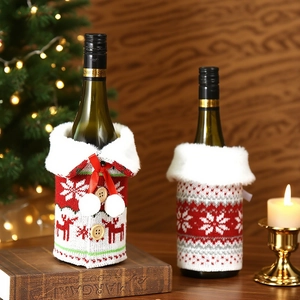 Christmas knitted wine bottle cover with faux fur collar and festive reindeer pattern