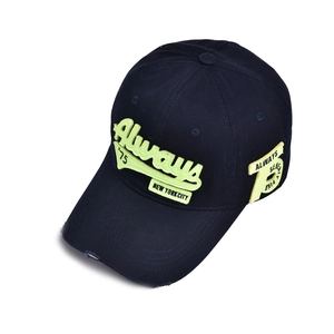 Detailed view of vintage distressed navy baseball cap with neon yellow 75 embroidery