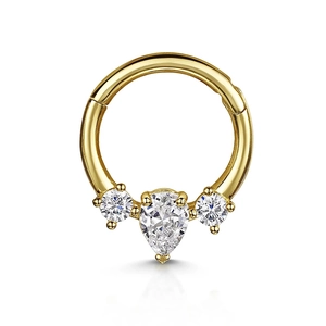 Detail of gold clicker nose ring with pear and round cut cubic zirconia stones