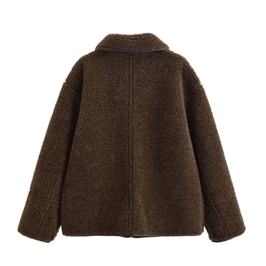 Detailed back view of the brown fleece texture on a loose French style hooded jacket