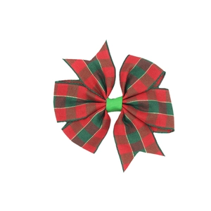 Christmas hair bow clip featuring red and green plaid patterns with golden thread accents