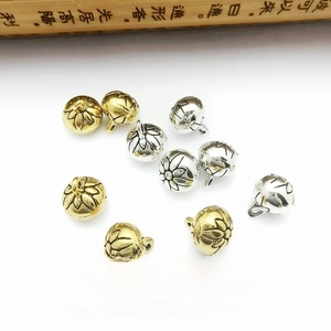 Detail of 9mm hollow flower metal beads in vintage gold and silver for DIY jewelry