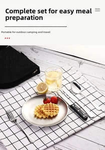 Macro view of stainless steel camping cutlery set including plate and a black storage bag