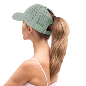 Detail of mint green quick-dry ponytail baseball cap with laser-cut ventilation holes