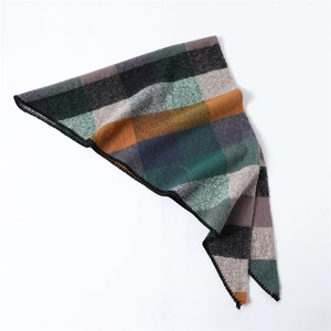 Detail view of multicolored check cashmere-feel scarf with black stitched hem edges