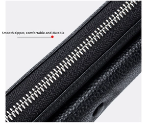 Detail of black lychee leather bag with high-quality smooth silver metal zipper