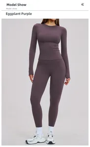 Detail of eggplant purple two-piece yoga set with high-waist leggings and long sleeve top