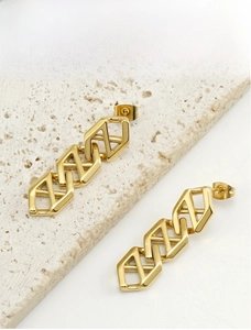 Detail of 18K gold-plated stainless steel geometric earrings with hexagonal hollow frames