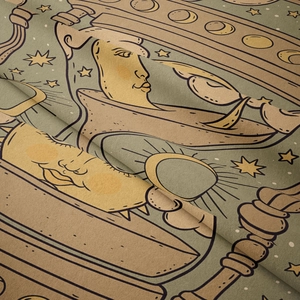 Detailed close-up of retro sun and moon tapestry with gold mystical tarot prints