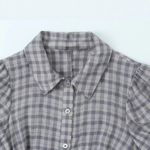 Plaid mini dress with tiered hem, light purple and grey check pattern with puff sleeves