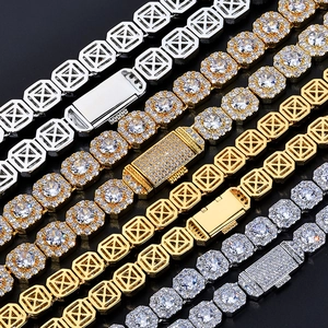 Detailed close-up of hip-hop iced out square link chains with gold and silver zircon inlay