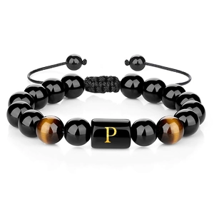 Detailed shot of 10mm black agate beads and tiger eye stones with letter P charm
