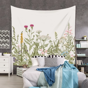 Close-up of bohemian floral wall tapestry with vibrant botanical prints and soft fabric
