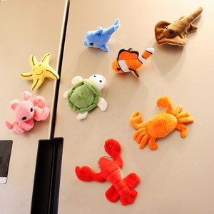 Set of 8 colorful plush ocean animal fridge magnets including clownfish and dolphin
