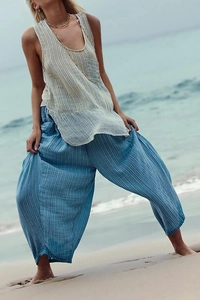 Close-up of lightweight striped fabric texture and breathable linen material for casual pants