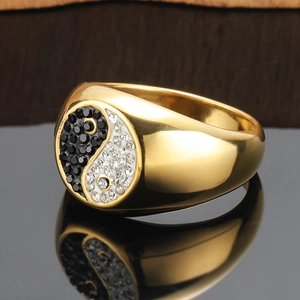 Gold vintage tai chi yin yang ring with black and white zircon stones on polished band