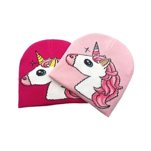Kids knitted unicorn beanies in pink and rose red with colorful jacquard patterns