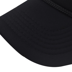 Detail of black trucker hat with braided rope decor and five-row stitching on the visor