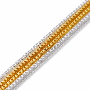 Macro detail of high-quality gold and silver box chains for DIY jewelry making