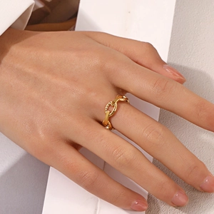 Golden chain texture stainless steel open ring worn on finger for a stylish look