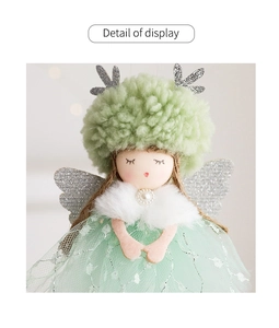 Detail of mint green Christmas fairy ornament with sequin mesh skirt and fur collar