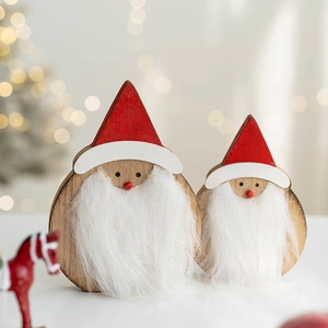 Handcrafted wooden Santa Claus figurines with red hats and white faux fur beards set of two