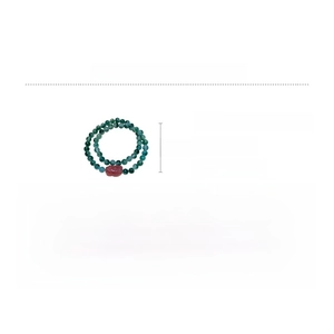 Detailed view of double-layer agate beaded bracelet with red carved bead and green stones