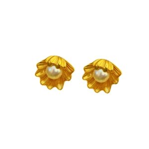 Vintage shell pearl stud earrings in gold-tone metal with a French minimalist style