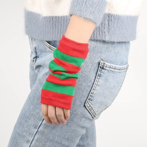 Detail shot of festive red and green striped knitted arm warmers for holiday cosplays