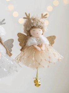 Macro detail of Christmas angel doll with mesh skirt, golden antlers and bells