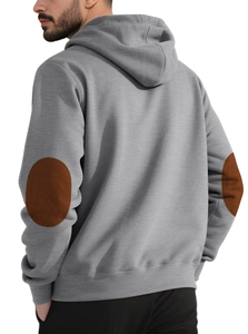 Detail of gray hoodie showing brown oval elbow patches and tight cotton knit texture